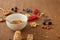 Bowl with granola next to berries