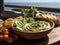 bowl of Greek-style vegan hummus surrounded by cherry tomatoes