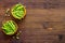 Bowl of green pea pod with beans on kitchen desk. Top view