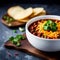 bowl of hearty chili with tender chunks of beef, rich tomato sause, and a mix of spices