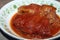 Bowl of Homemade Cabbage Rolls in a tangy Tomato Sauce