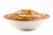 Bowl with homemade dulce de leche, condensed cream or doughy caramel, isolated white background