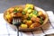 A bowl of homemade freshly prepared Bread Upma, a savory and spicy South Indian bread dish