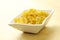 Bowl of italian tubetti pasta - wooden background
