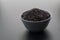 Bowl of jasmine black rice on black backgrounds