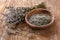 Bowl with lavender flowers on wooden table