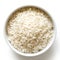 Bowl of long grain white rice on white.