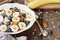 Bowl of Oatmeal Bananas, Pecans, honey and Blueberries