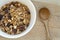 Bowl of organic muesli and spoon