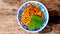 A bowl of pasta with tamarind leaves