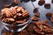 Bowl with pecan nuts on wooden table