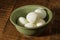 Bowl of peeled hard boiled eggs