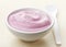 Bowl of pink blueberry yogurt