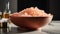 Bowl Of Pink Himalayan Salt For Skin Exfoliation