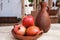Bowl of pomegranate fruits and earthenware pitcher