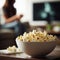 Bowl of popcorn sits on coffee table (daytime)