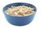 Bowl with prepared oatmeal on white background