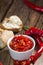 Bowl with preserved red Chilis