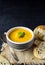 A bowl of pumpkin potato vegetable soup