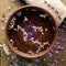 Bowl of pure water and lavender petals