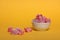 A bowl of rahat lakoum  on yellow background horizontal image. Turkish sweet concept