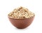 Bowl with raw oatmeal on white background