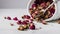 A bowl of rose petals with a spoon