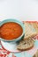 Bowl of rustic soup with bread