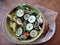 Bowl of Salad and bread on plate