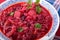 Bowl of sauerkraut soup with beet and pearl barley