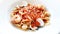 Bowl of Seafood Linguini isolated on a white plate background