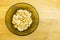 Bowl with shelled peanuts. View from above.