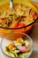 A bowl of Soto Betawi, Indonesian native traditional soup made of beef or beef offal cooked in coconut milk broth with pickles