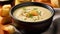 Bowl of soup with bread and croutons