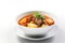 A bowl of soup with meat and potatoes on a plate. AI generative image.