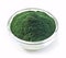 Bowl of spirulina algae powder