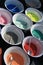 Bowl and spoon with colorful sand