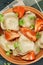 Bowl of steamed dumplings overhead closeup