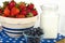 Bowl of Strawberries, blueberries and Milk