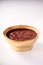 Bowl of sweet and fresh red bean paste on white background, Cantonese style dessert