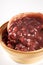 Bowl of sweet and fresh red bean paste on white background, Cantonese style dessert