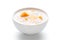a bowl of sweet sago cream with mango and coconut milk on white background