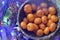 Bowl with tangerines. Christmas photo. Fruits in a wooden bowl