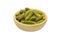 Bowl of tasty canned whole green cornichons isolated on a white background