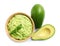 Bowl of tasty guacamole with basil and avocados on white background