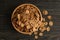 Bowl of tasty muesli on wooden background