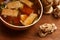 Bowl of tasty traditional japanese miso soup with fried tofu pie