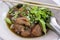 Bowl of thai style pork noodle soup