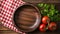 a bowl and tomatoes on a table