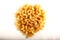 Bowl of uncooked elbow macaroni pasta